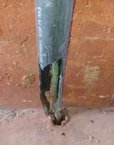 Uma imagem contendo edifício, ao ar livre, tijolo, sujo
Descrição gerada automaticamente